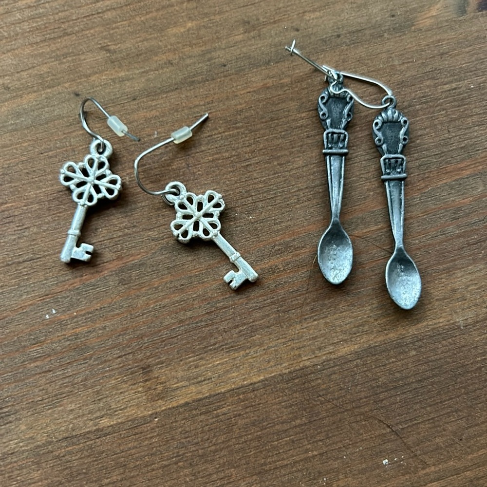 two pairs of earrings